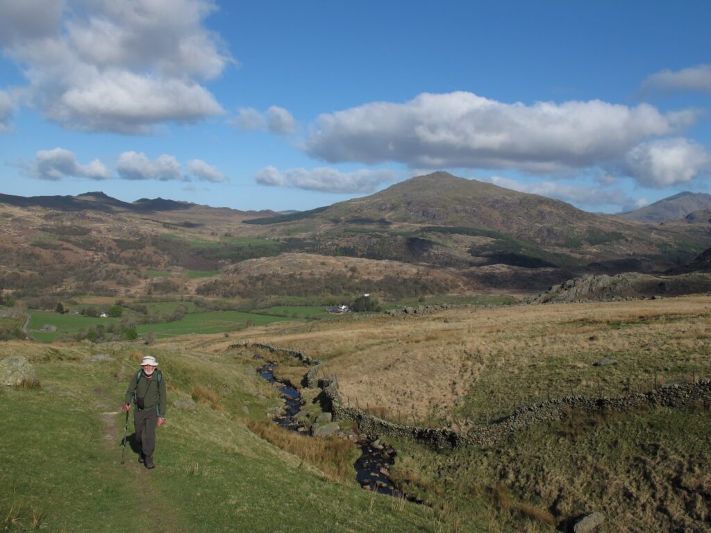 John Sutcliffe above the Duddon Valley and Harter Fell behind