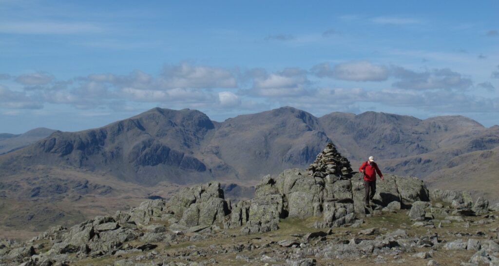 Roger at the cairn on Grey Friar